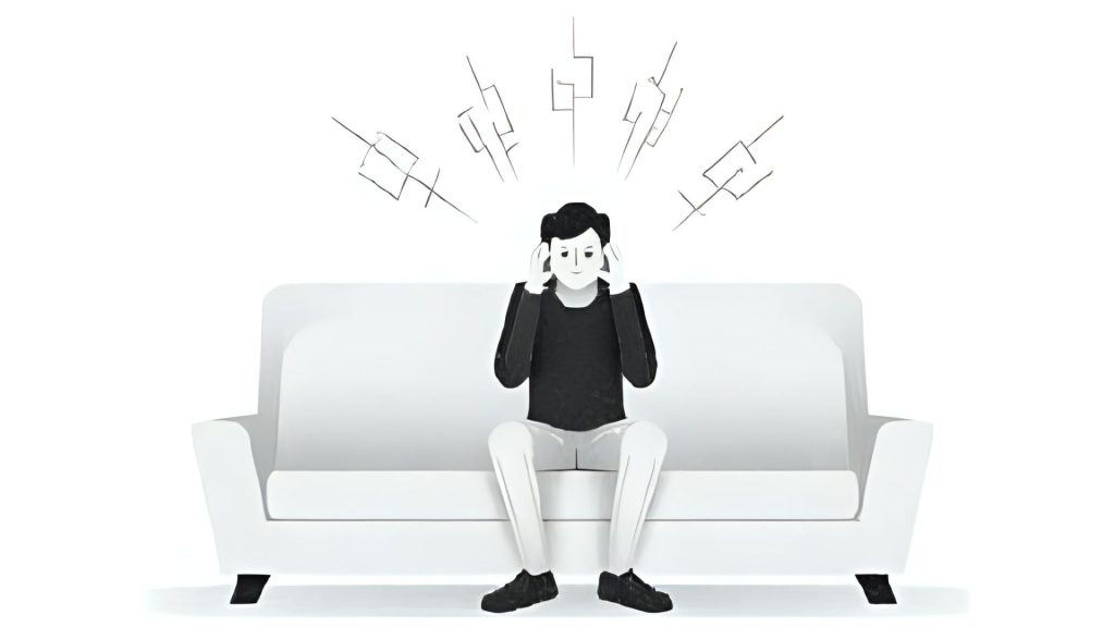 man being stressed on a couch because of noise